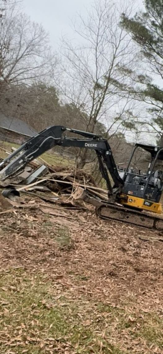Heavy equipment light structural demolition jobsite